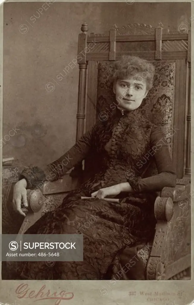 USA, Illinois, Chicago, Portrait of woman sitting in chair