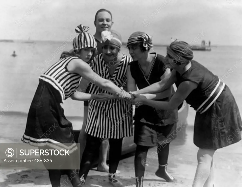 Women in swimwear on beach