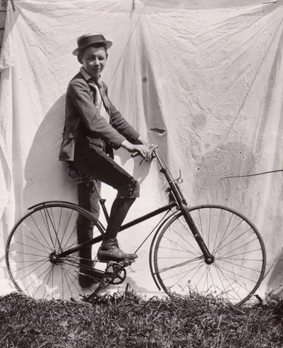 Portrait of boy on bicycle