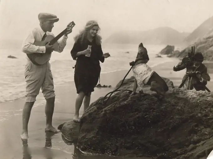 Director Henry King showing his star Mary Miles Minter how easy it is to get dog to howl in scene