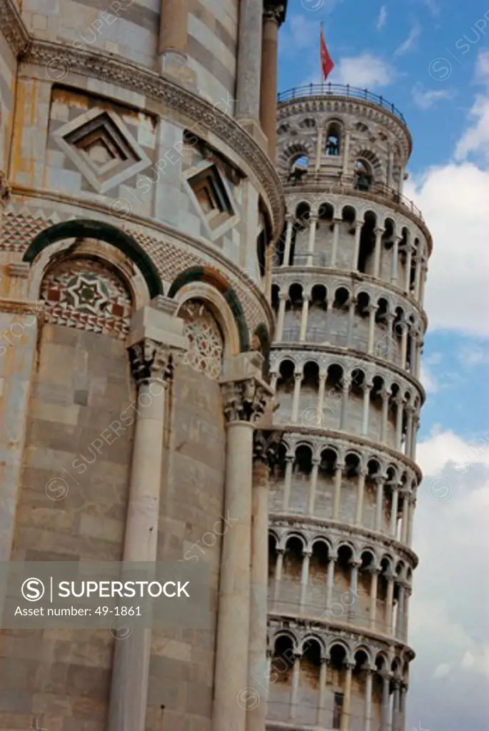 Low angle view of a cathedral near a bell tower, Duomo, Leaning Tower, Pisa, Italy