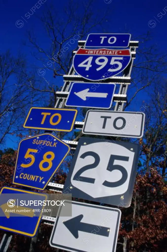 Low angle view of an array of road signs