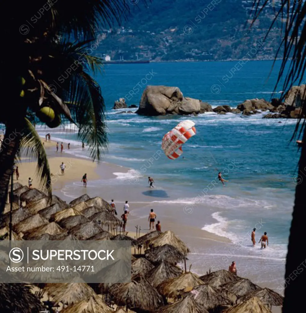 High angle view of tourists on the beach, Acapulco, Mexico