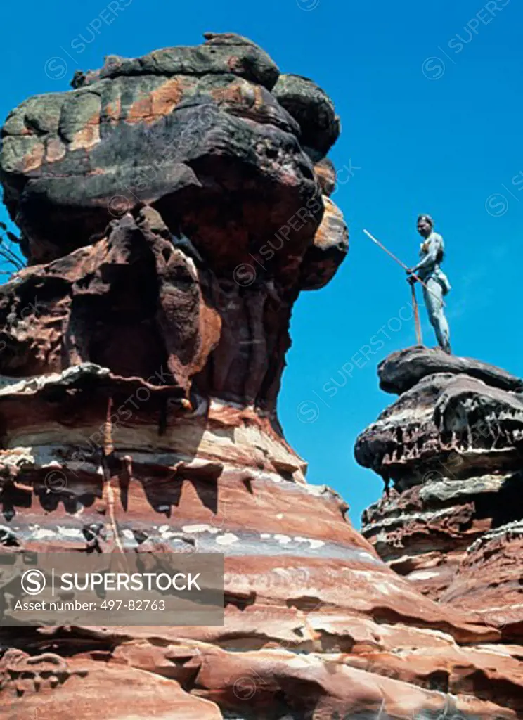 Person standing on a rock formation, Elcho Island, Arnhem land, Northern Territory, Australia