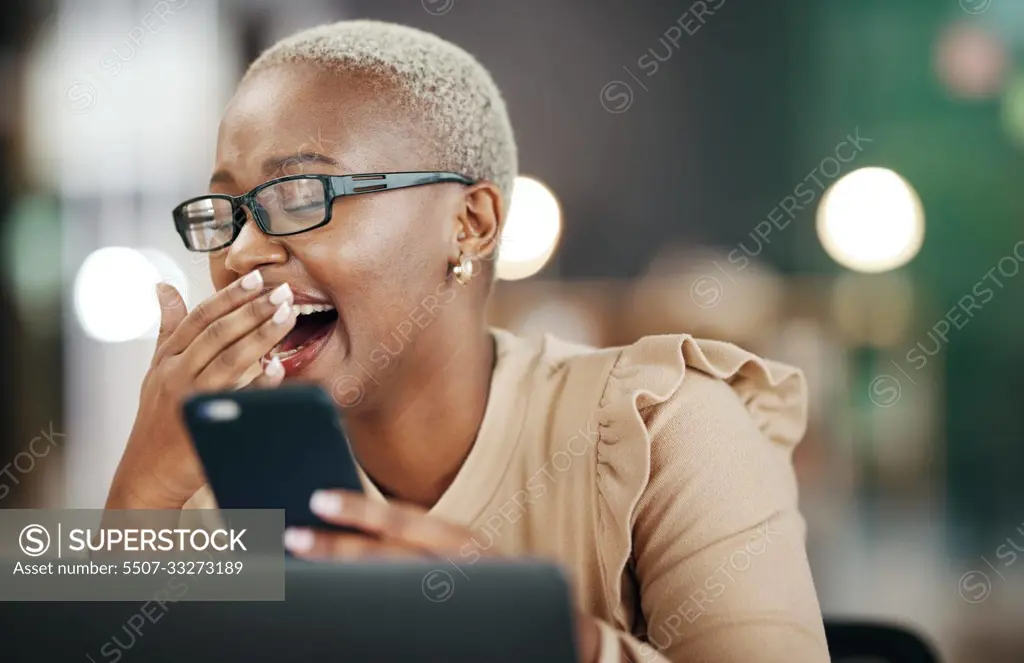 Black woman laughing, phone and reading online post, social media or internet meme in office, workplace and night bokeh. Happy person with funny video, chat or networking on smartphone or cellphone
