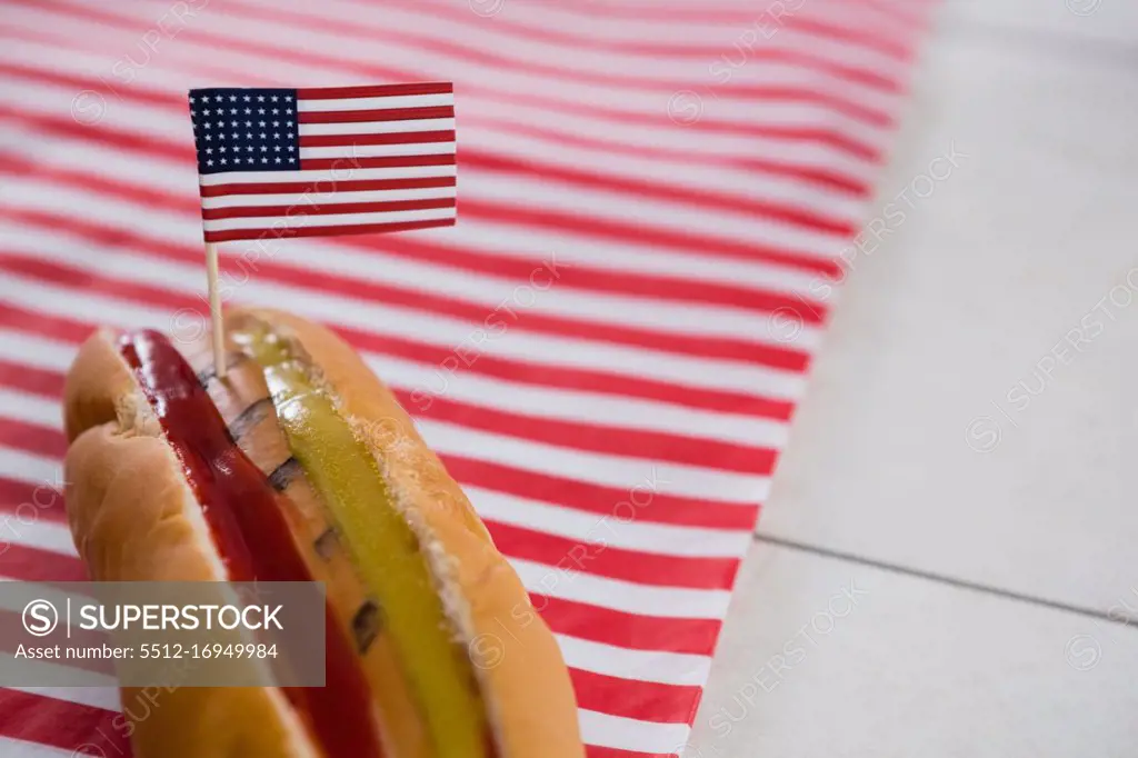Close-up of Hot dog on wooden table with 4th july theme