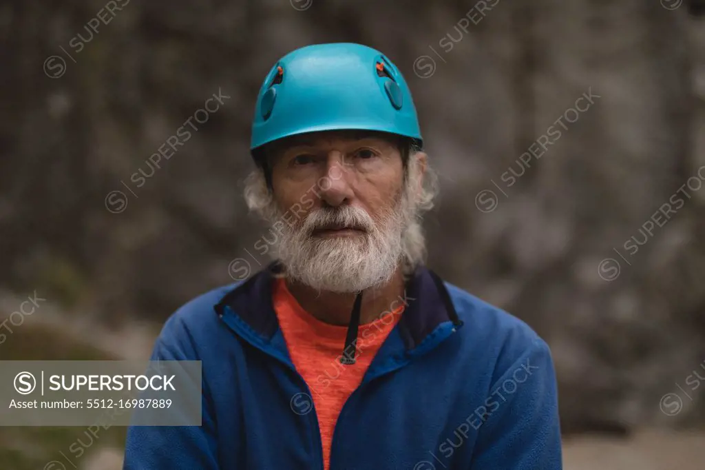 Portrait of senior man wearing protective helmet