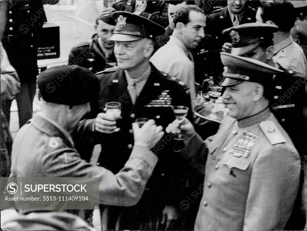 Marshal Zhukov (right) and General Eisenhower (center) drink a toast with Field Marshal Montgomery (left) during their meeting at Frankfurt in June 1945. July 31, 1953. (Photo by Paul Popper Ltd.).