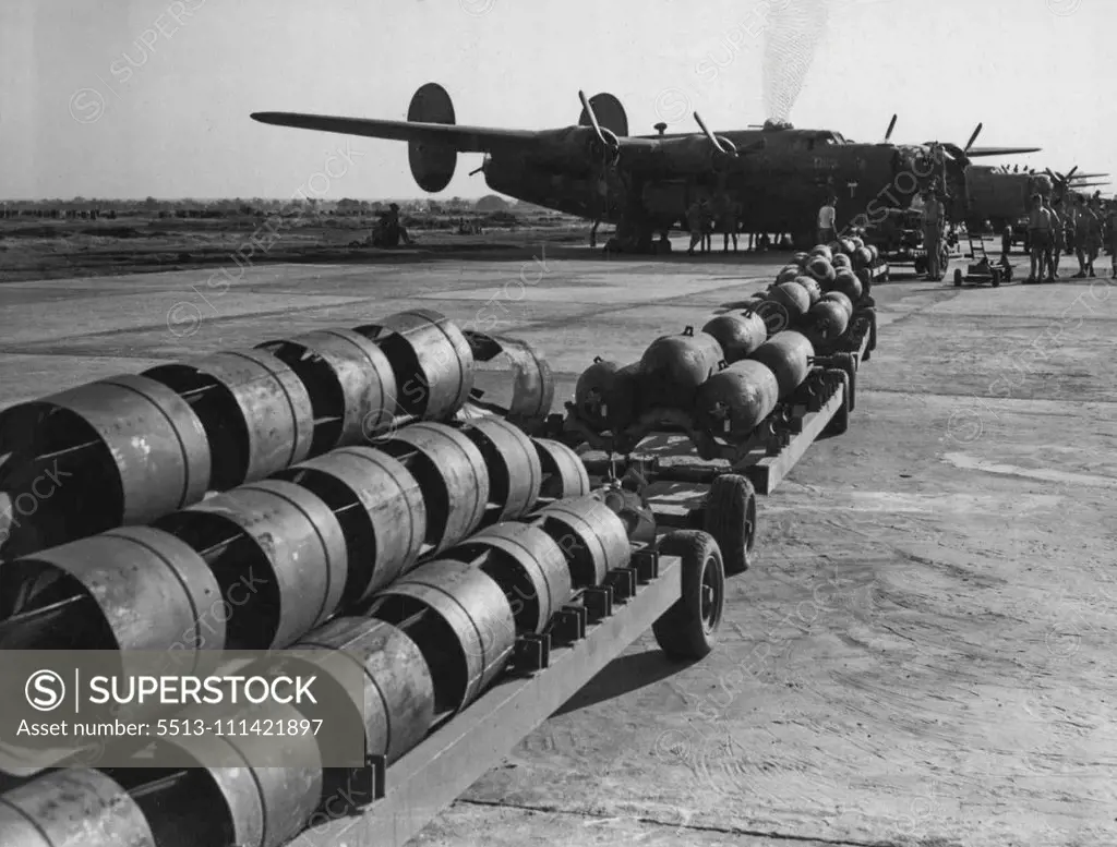 89C - Loading Bombs And Ammunition - Bombing Crew At Work, Gunners Etc. December 26, 1944. (Photo by Commonwealth Of Australia Department Of Air).