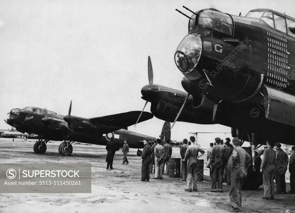 The Lancaster bomber "Aries" on a world navigational flight, drawn up beside another Lancaster "G for George," at Laverton aerodrome, Victoria. "G. for George" is to be exhibited in the National War Museum, Canberra. November 17, 1944.