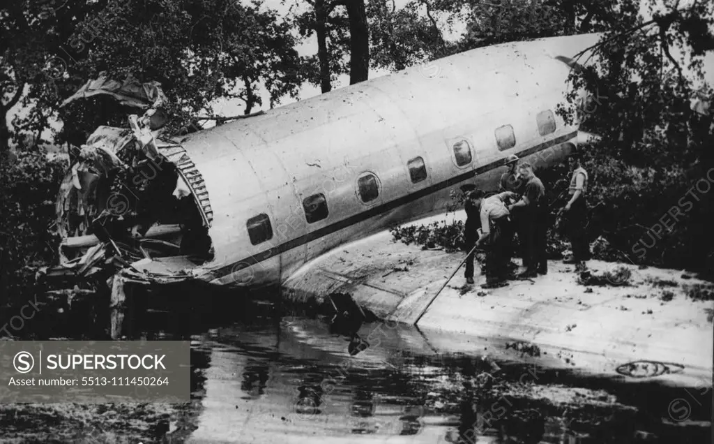 British Luxury Air Liner Crashes On Test Flight -- Part of wreckage of Tudor II Luxury air liner which dived to earth on a test flight near Woodford, Cheshire, England, August 23. Four men died, another was seriously injured and a sixth escaped unhurt. Tudor II was designed by Mr. Roy Chadwick (man who designed R.A.F. Lancaster Bomber) a director of A.V. Roe Ltd. builders of the air liner. Chadwick was killed in this crash. August 24, 1947. (Photo by Associated Press Photo).