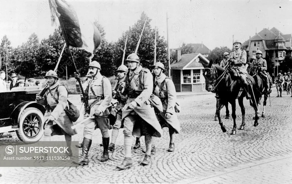 French Troops Leave Essen: French troops leaving with their colours. Animated scenes were witnessed on the departure the French troops from Essen. January 1, 1929. (Photo by Central News).