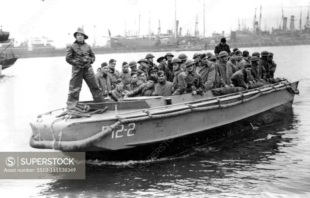 The American Forces Arrive in Iceland: Infantry troops come ashore in a tender from their transports on their arrival in Iceland to Garrison the Island with our own troops. May 24, 1942. (Photo by The Associated Press of Great Britain Ltd.).