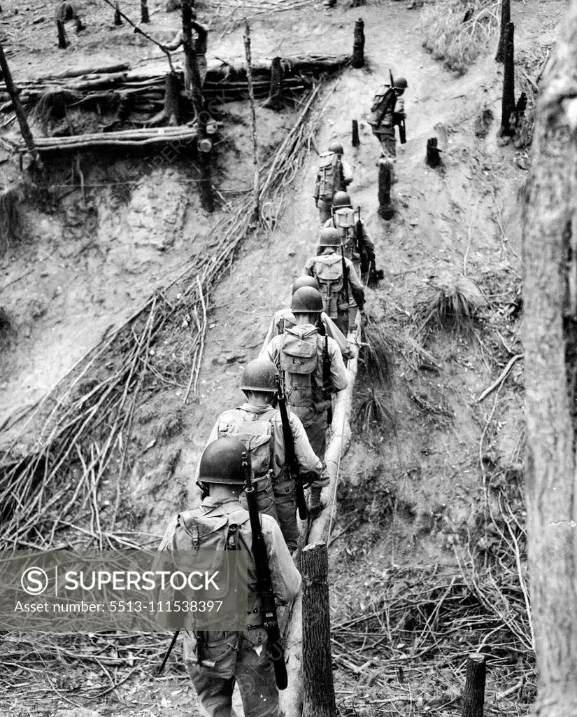 Some of General MacArthur's troops on the obstacle course at their camp "somewhere in Australia" where they are undergoing a severe training regime in jungle fighting. August 29, 1943. (Photo by Signal Corps, U.S. Army).