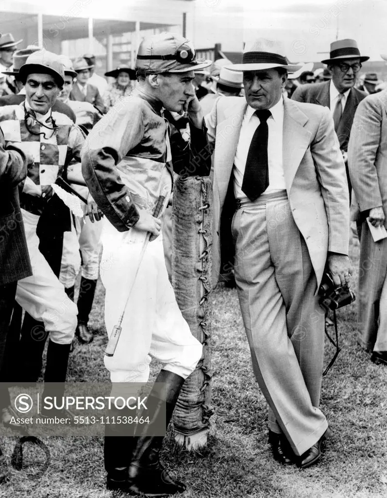 Jockey J. Thompson and trainer C. Rolls of "Close Link" prior to 1st Race. January 19, 1955.