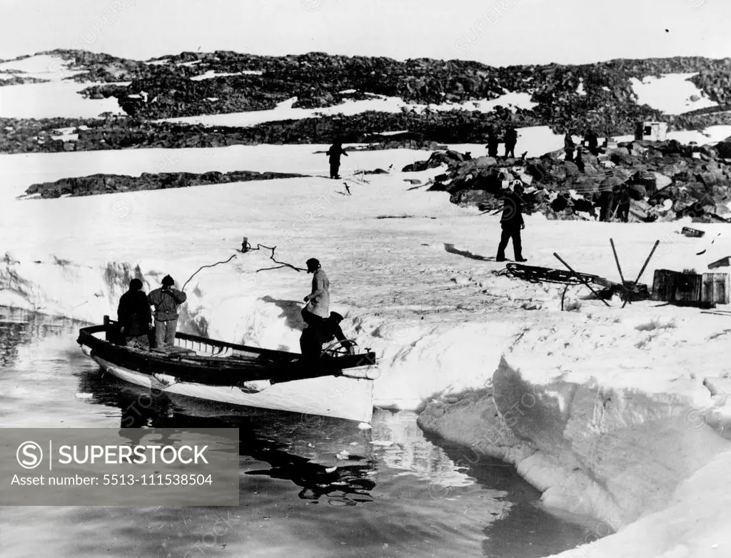 Mawson revisits former winter Quarters. After a lapse of 18 years Sir Douglas Mawson revisited the old winter quarters of his Australian Antarctic Expedition of 191101914. A landing is being made at Cape Denison, King George the Fifth Land. May 19, 1931. (Photo by Captain Frank Hurley, Herald Feature Service).