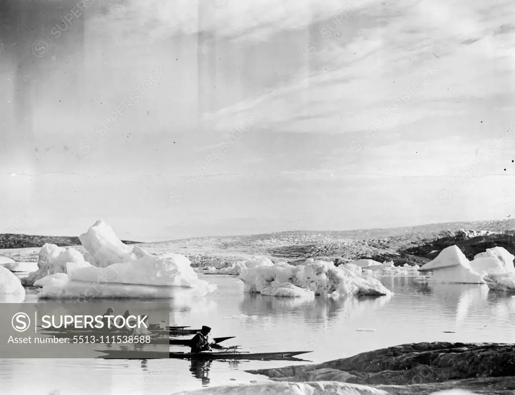 British Arctic Air Route Expedition: Four Greenlanders about to return home to Angmagssalik, the day after assisting the motor-boat to reach the base. September 22, 1931, (Photo by British Arctic Air Route Expedition Photograph).