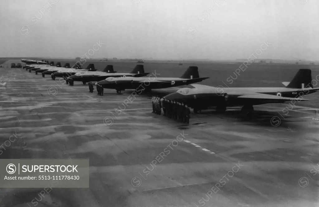 Britain's Jet Bomber Squadron Goes On Parade -- An impressive picture showing a line-up of Canberra jet. bombers which make up No 101 Squadron-Britain's first jet bomber squadron. With them at Binbrook in process of converting to Canberra's is 617 Squadron, the R.A.F's famous dam buster unit. The twin-jet Canberra -it has a crew of three-pilot, navigator-plotter and observer-is the most expensive airplane so far in service with the Royal Air Force. Before 101 Squadron, was equipped with these p