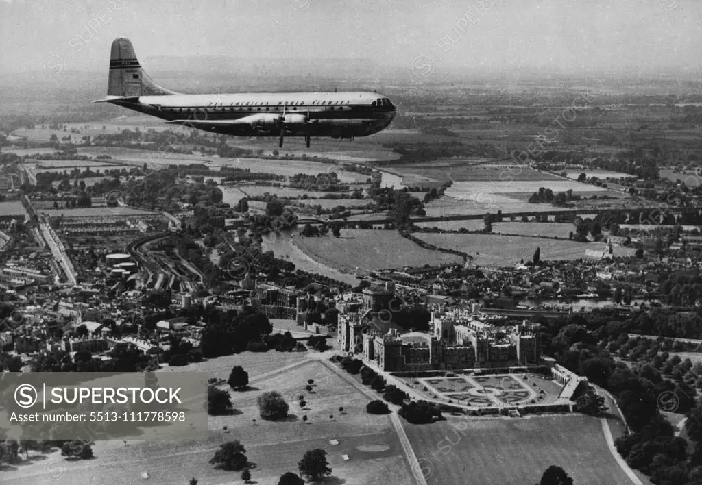 The Span of A Thousand Years Nearly a thousand years of history glides under the majestic wings of this Pan American 'Stratocruiser', world's largest aeroplane in commercial service, as she passes over Windsor Castle en route to London Airport from New York. Beneath the 'Stratocruiser' the Castle - a Royal residence since the days of William the Conqueror (although it was built mainly by Henry III) - spreads its gracious grey bulk on the banks of the River Thames, winding through the chequered B