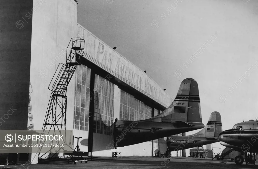 Even The Big hangars at San Francisco are too small for the new giant Pan-American Strato Clippers. To solve the problem, special holes were made made in the doorways. This picture was secured by a Sun photographer who has just returned from US. March 15, 1951.