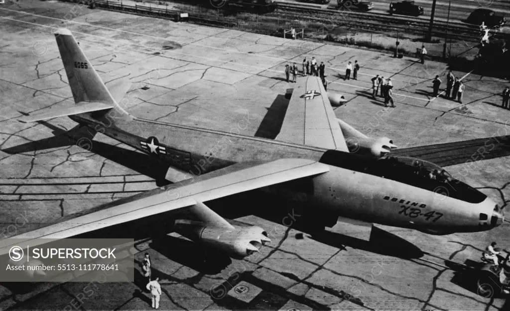 New High Speed Jet Bomber Has Sweptback Wings -- As large as B-29 Superfortress, this new Boeing XB-47 rolled out of hangar today is powered with six jet engines. The Army Air Forces and Boeing call it a "radical new experimental design" with the inverted wings and tail surfaces. Ground and taxing tests starts soon. September 29, 1948. (Photo by AP Wirephoto).