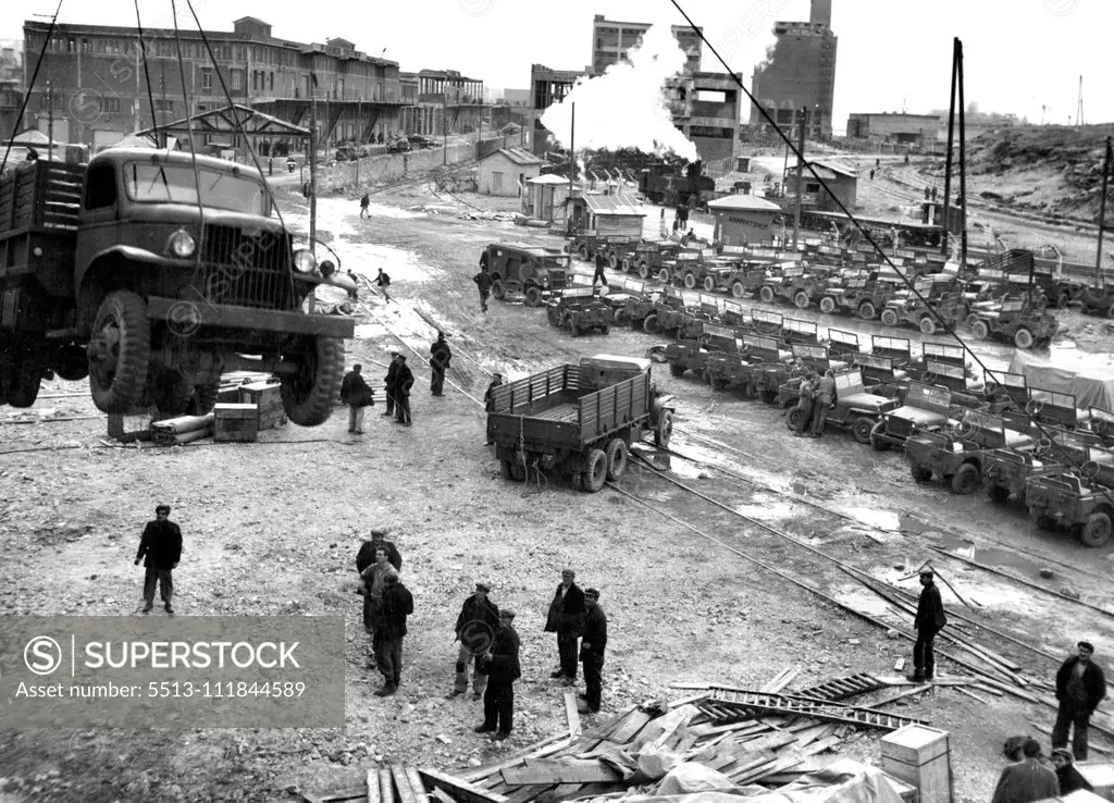 UNRRA jeeps and trucks being landed at No.5 Quay at Piraeus. They are some of the 3500 trucks and over 300 jeeps which UNRRA Greece Mission has imported from the U.S. Army in Italy. By the end 1945 UNRRA had brought in all 5000 trucks, 320 jeeps, 112 motorcycles, 10000 tires and 1500 cases of spare parts into Greece. August 5, 1947. (Photo by UNRRA Photo).;UNRRA jeeps and trucks being landed at No.5 Quay at Piraeus. They are some of the 3500 trucks and over 300 jeeps which UNRRA Greece Mission h