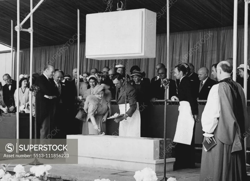 Queen Lays Foundation Stone Of National Theatre -- The scene at the site of the South Bank between the Royal Festival Hall and Waterloo Bridge this morning, when H.M. The Queen laid the foundation stone of the National Theatre. Princess Elizabeth is seen behind the Queen, and the Archbishop of Canterbury on the right. August 09, 1951.;Queen Lays Foundation Stone Of National Theatre -- The scene at the site of the South Bank between the Royal Festival Hall and Waterloo Bridge this morning, when H