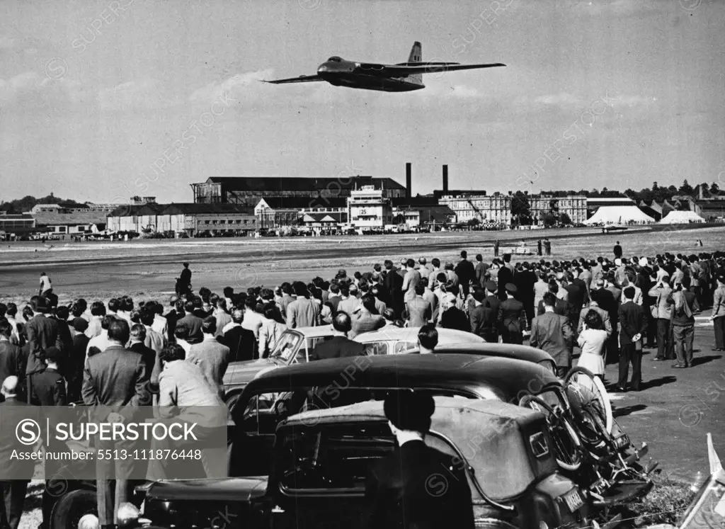 The Farnborough Aircraft Display -- The Vickers Armstrong Valiant, which is powered by Four Rolls-Royce Avon turbo jet engines, seen in flight during the flying display and watched by some of the visitors to the show. Some of the world's most advanced military and civil aircraft are on view for the first time at the Society of British Aircraft Constructors's display, which opened at Farnborough, Hants., on Sept. 1st1/3. September 2, 1952. (Photo by Fox Photos). ;The Farnborough Aircraft Display 