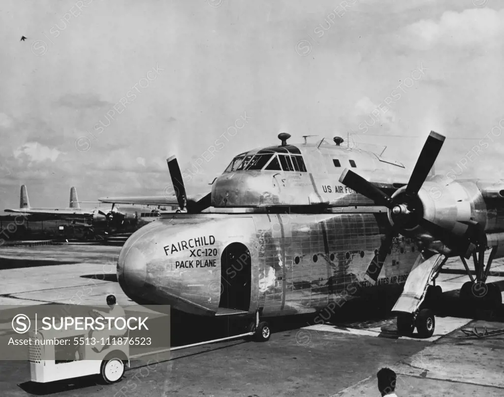 A tractor towing the detachable cargo compartment from the XC-120 Packplane. A detachable-fuselage transport airplane was demonstrated recently by the United States Air Force at Hagerstown, Maryland. Known as the Fairchild XC-120 Packplane the twin-engined, high-wing monoplane carries a removable "pod" which can carry 36 litter patients, 64 fully equipped troops, or 20,000 pounds of cargo. In operation, the airplanes is designed to fly into a forward area, have its fuselage or "pod' detached in