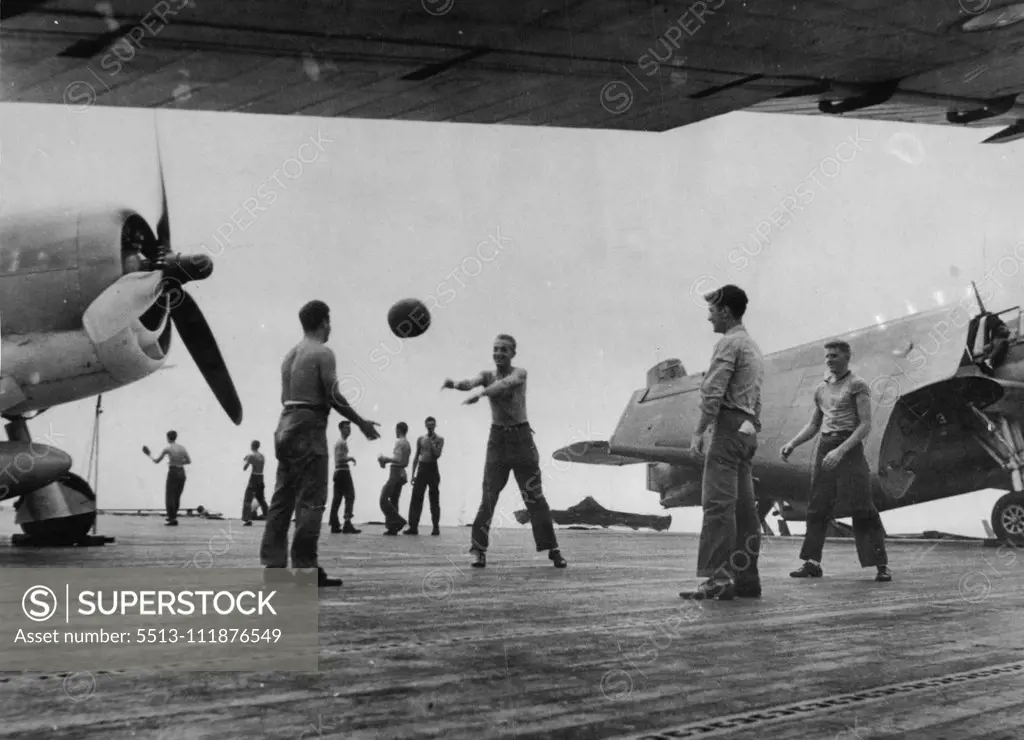 A game ball aboard a United States Navy aircraft carrier in Central Pacific operations, against Japanese strongholds. March 14, 1944. (Photo by Official U.S. Navy Photograph).;A game ball aboard a United States Navy aircraft carrier in Central Pacific operations, against Japanese strongholds.