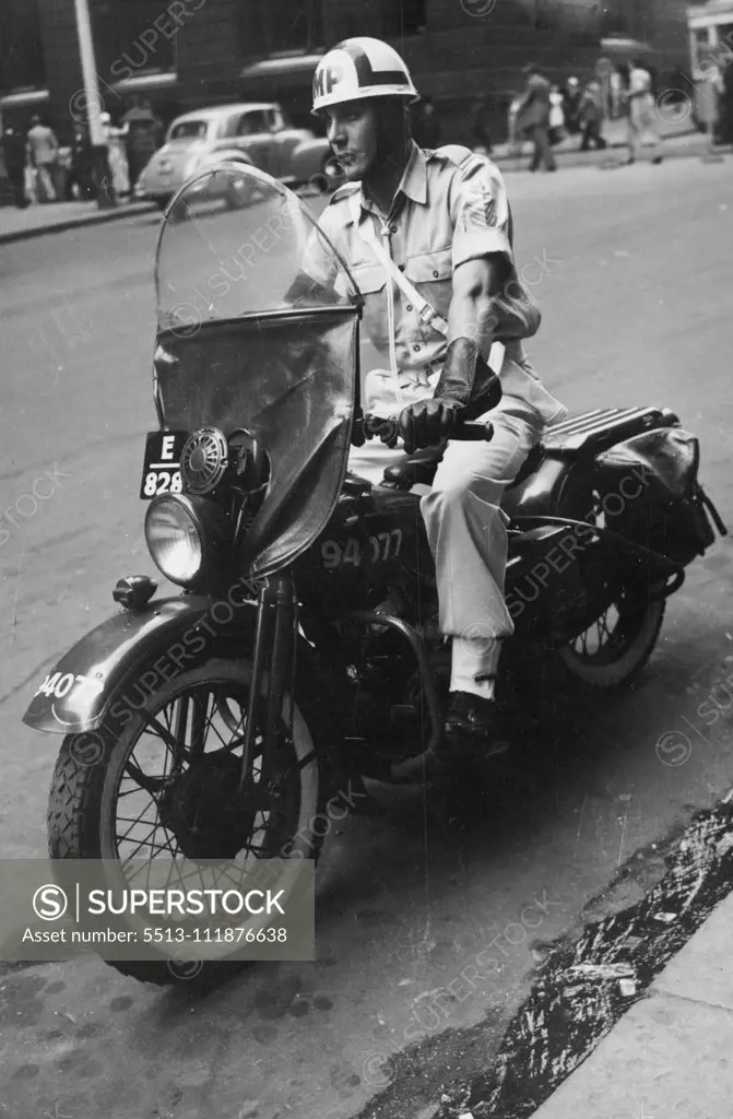 CPL. C. Watts, an army despatch rider, arriving at the Hotel Australia with despatches for experts attending today's financial conference. January 05, 1954.;CPL. C. Watts, an army despatch rider, arriving at the Hotel Australia with despatches for experts attending today's financial conference.