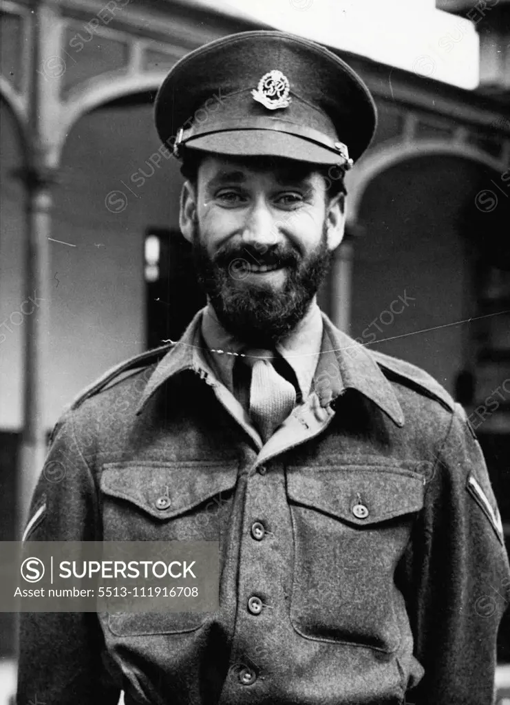 Back to The Army Like This -- Mike Flynn - and beard. A head popped round the guardroom door and a cheery voice said: "Morning. Sarge, I'm reporting for Reservist training." The duty sergeant at Warburg Barracks, Aldershot, the home of Army "Redcaps", looked up.....and nearly had a fit. For the caller twenty-year-old Michael Flynn, of Croydon, had a beard. A big, bushy, black-brown beard. Calmly Mike explained that he was up for his fortnight's training in the Military Police Reserve. But that b