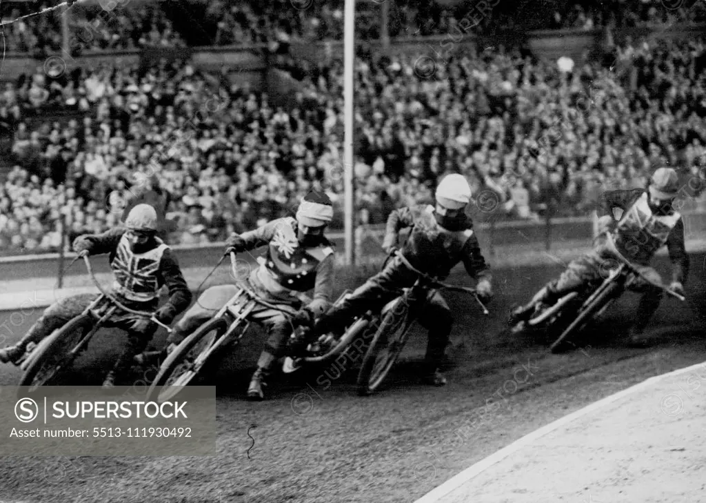 Australia Wins Speedway Test : A fight for the lead on a corner. Left to right are Alan Hunt (England); Merv Harding (Australia); and Bert Roger (England). Australia beat England 56-52 in the speedway test at Wembly, London, last night. England is now two down. June 27, 1952. (Photo by Paul Popper Ltd.).