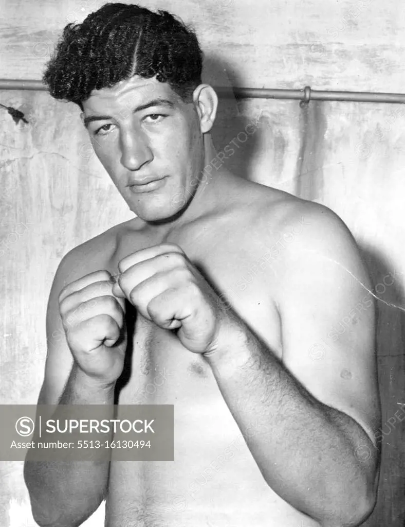 Ewart Potgieter, a 21-year-old farmer from Vryheid, in Northern Natal, South Africa, who tremendous size (7ft 2in, 3181b) make shim the Union's newest ring sensation. He won his first fight inside 30 seconds of the first bell. August 03, 1955.