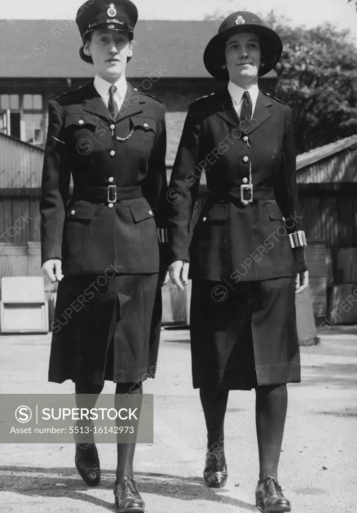 Modelling New Uniform For Policewomen The two uniforms at New Scotland Yard, London (left today July 23. The new outfit is on ***** and the present type on right. A new style uniform for policewomen will be issued sometime in November. This uniform has been designed to serve both in winter and summer, where as policewomen have been issued with summer and winter uniforms up to the present. It is made of Barathea and the tunic is improved in cut and design, with padded shoulders and two top patch pockets. A new six-pleat skirt has been designed so that it will hang better. July 23, 1946. (Photo by Associated Press Photo).