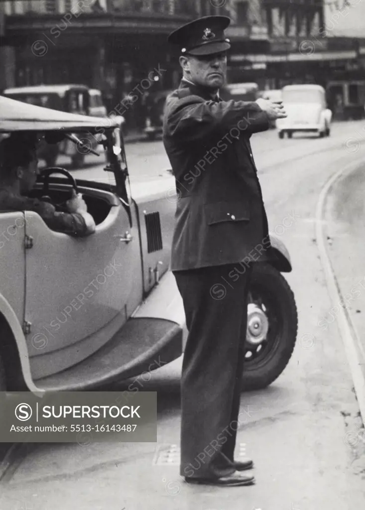 Traffic Police Sydney -- Jack Young, Paking police traffic duty George & Bathurst Sts. October 15, 1946.