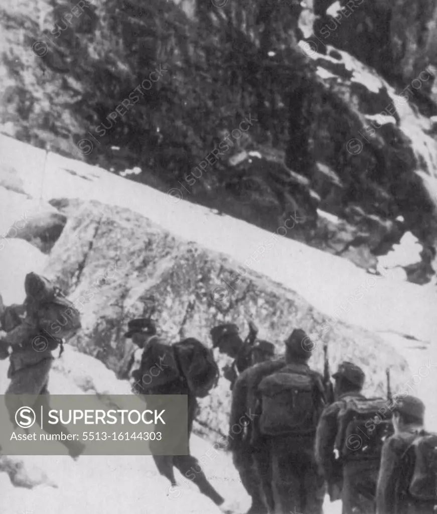 When Nazis Were In The Caucasus -- These soldiers are identified as German mountaineers on an observation patrol in the Caucasus mountains of Russia. Since this photo was made Russian forces have recaptured most of the Caucasus territory taken by the Germans. This photo reached the U.S. by way of London. February 7, 1943. (Photo by AP Wirephoto). 