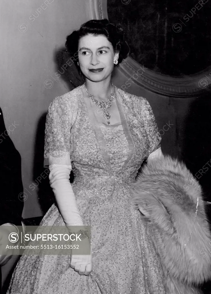 Princess At The Ballet. Princess Elizabeth, in a striking crinoline gown, pictured when with the Queen, she attended a gala performance of Frederick Ashton's new ballet "Tiresias" at the Royal Opera House, Covent Garden. The performance was held in aid of the Sadler's Wells Ballet Benevolent Fund. July 9, 1951.