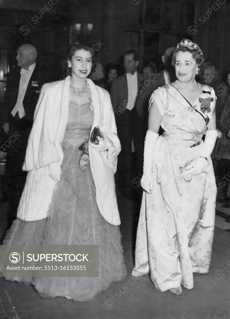 Princess Elizabeth Attends Dinner to Mrs. Roosevelt. Princess Elizabeth (left) arriving for the dinner reception with viscountess Greenwood, wire of the Viscount Greenwood (Chairman of the Memorial Committee of the Pilgrims') at the Savoy Hotel. Mrs Eleanor Roosevelt, who had earlier unveiled the memorial statue to the late President Franklin Delano Roosevelt in Grosvenor Square, was the guest of honour at a dinner given by the Pilgrims' Society at the Savoy Hotel, where tributes were paid the late President. April 13, 1948.