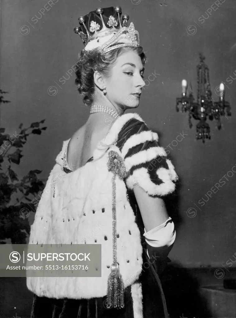 Magnificence - for one day. . . A model in the Royal dressmaker's proudly displays the regalia of a countess. A Hartnell model proudly displays the Coronation regalia of a countess. October 24, 1952. (Photo by Daily Mirror).