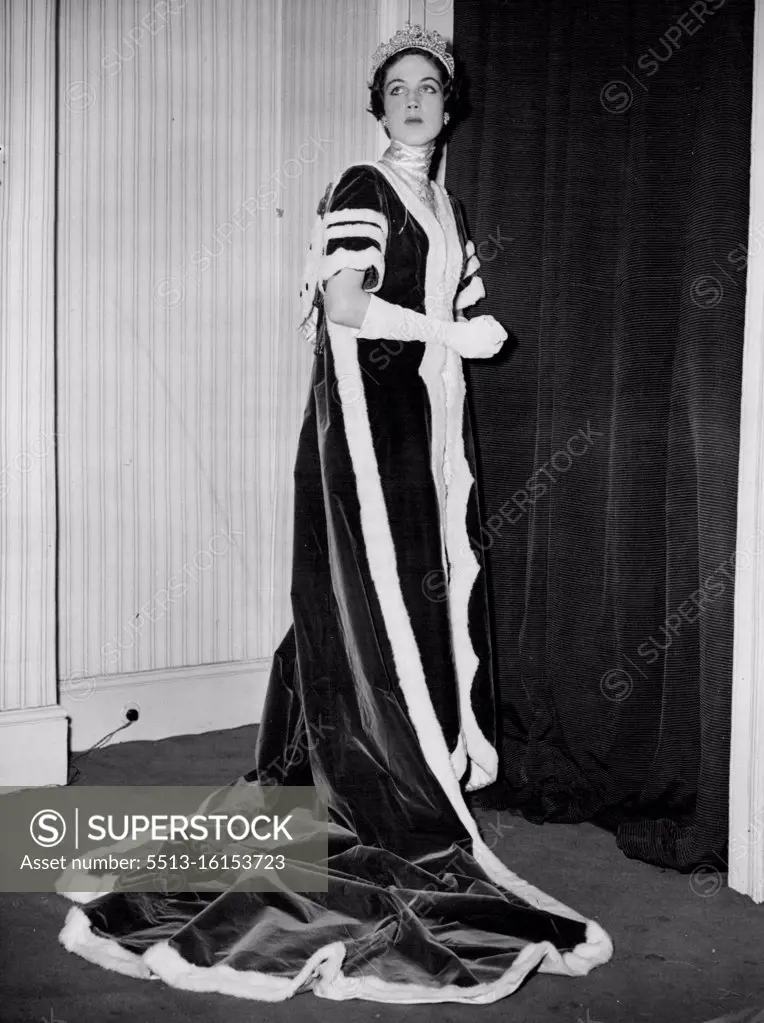 Queen Juliana will see Coronation Robe -- This Coronation robe will on view to Queen Juliana of the Netherlands when she attends a dress show tomorrow (Saturday). It is modelled here by Miss Margaret Du Cane at the Sloane Street (London) salon of Mr. Herbert Sidon, the Dutch fashion designer, whose creations will be shown in Amsterdam tomorrow and Sunday. Miss Du Cane is one of five English girls who will be there as models. This robe is essentially the same type of garment which has been worn at Coronations since George IV. September 05, 1952. (Photo by Reuterphoto).