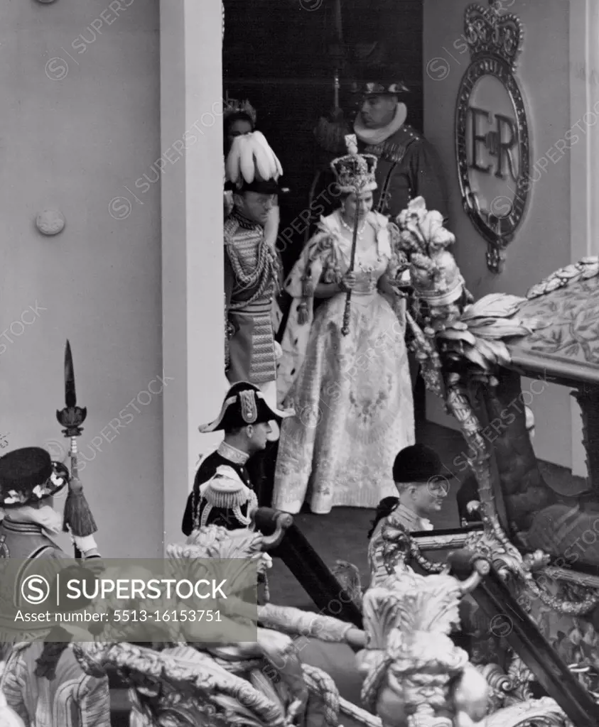 The Queen, arrayed in her State Robe of purple velvet and wearing the Imperial Crown leaving Westminster abbey after the Coronation Service. June 02, 1953. (Photo by Daily Mirror).