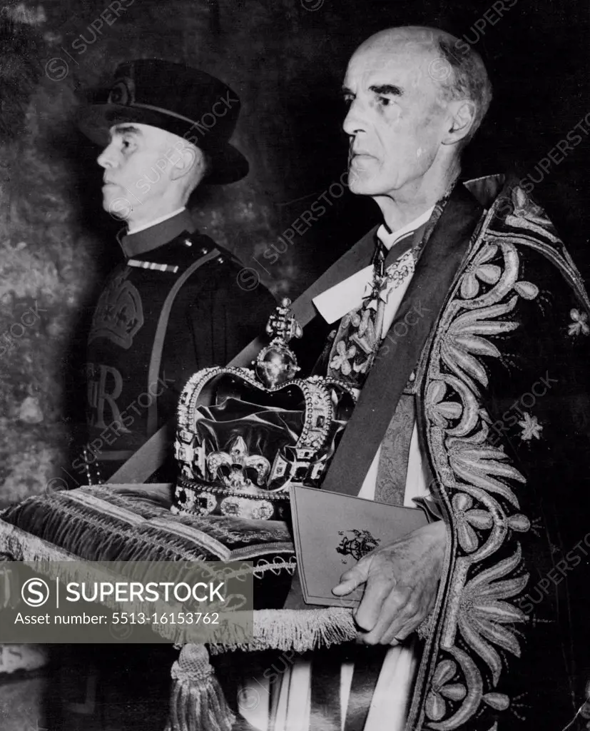 The Coronation Crown -- The Dean of Westminster, Dr. Don bears St. Edwards Crown in the Regalia Procession in Westminster Abbey this morning where Queen Elizabeth II was being crowned. June 02, 1953. (Photo by United Press Photo). 