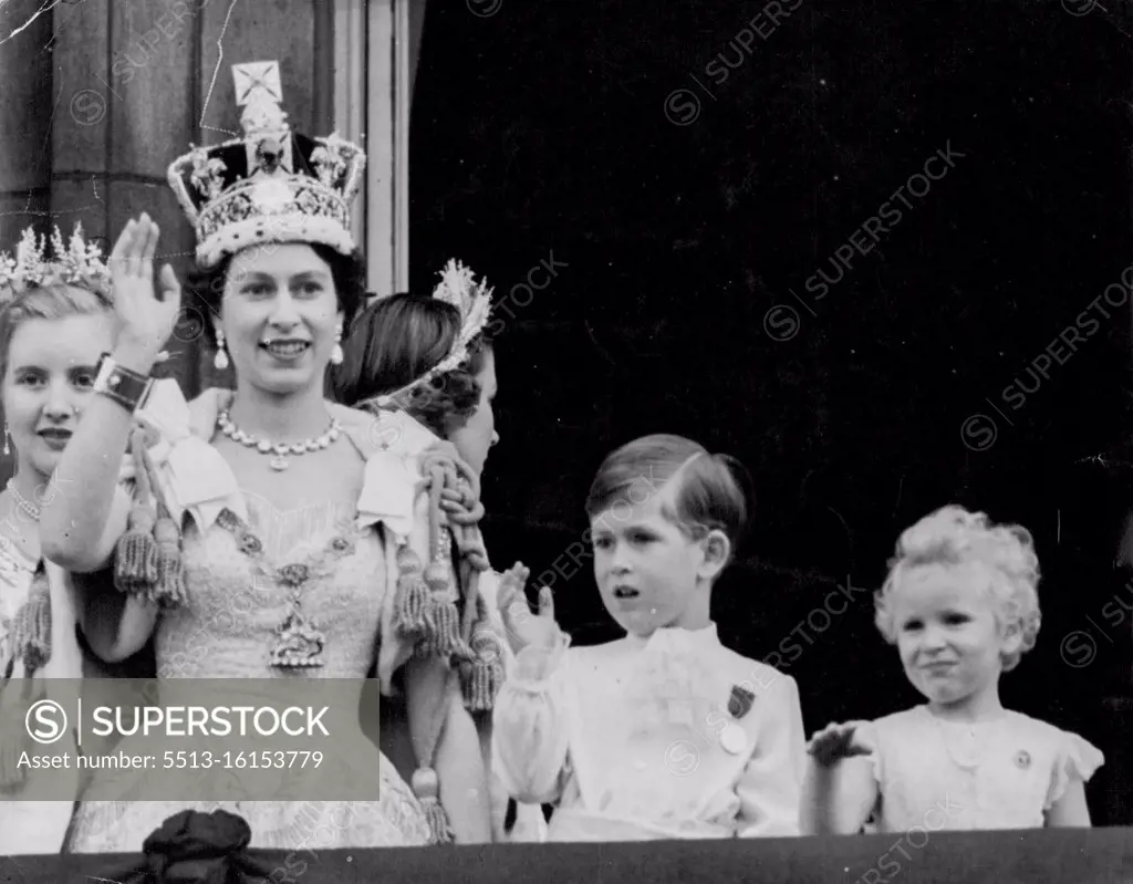 Crowned Queen And Her Children Wave From Palace Balcony -- Smiling and wearing the Imperial State Crown, the Queen is joined by her children, Prince Charles and Princess Anne, in waving from Buckingham Palace balcony to the cheering crowds in front of the Palace after the Coronation to-day (Tuesday). On left, behind the Queen, is Lady Anne Coke, one of the Queen's six maids of Honour at the Coronation. As the Queen, the Duke of Edinburgh and other members of the Royal Family appeared on the balcony, 168 jet fighters flew over in the Royal Air Force salute to the newly-crowned Sovereign. June 02, 1953.
