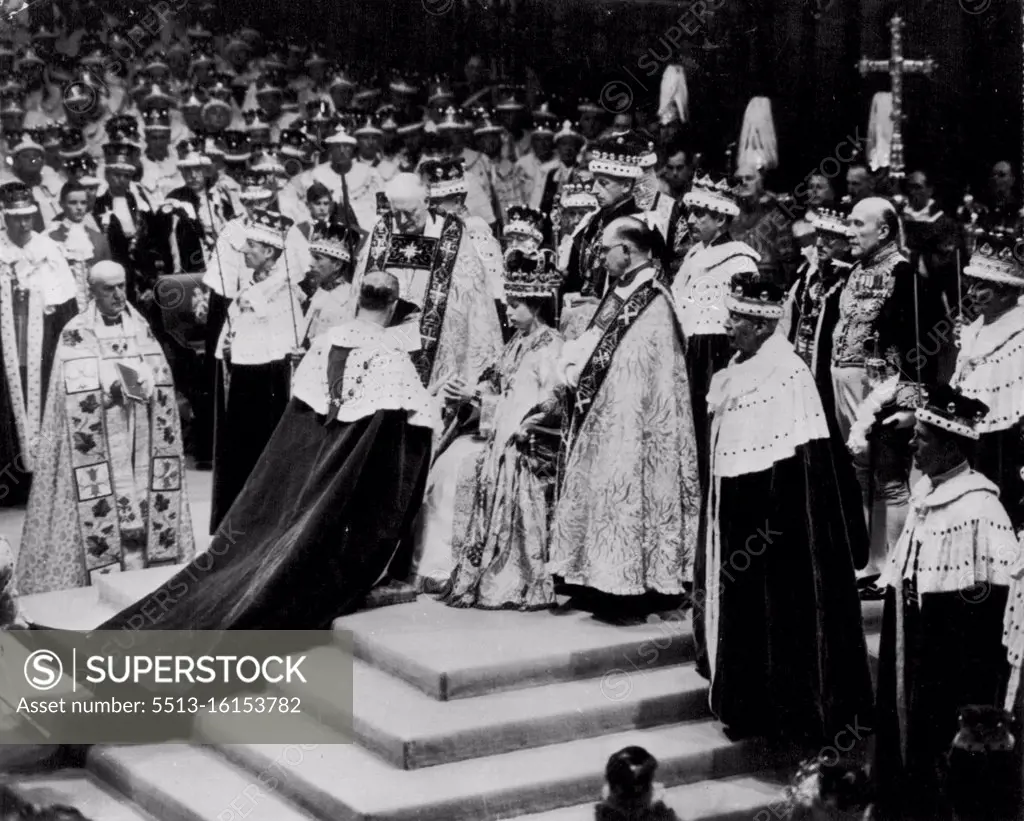 Duke Pays Homage To His Wife, The Queen - The Duke of Edinburgh kneels before the throne and pays hoamge to his wife Queen Elizabeth II, in Westminster Abbey after her coronation yesterday. Churchman at left, holding book, is the Archbishop of Canterbury. Flanking the Queen are the Bishop of Durham, left, and the Bishop of Bath and Wells. Others surrounding throne are unidentified peers and churchmen. June 03, 1953. (AP Wirephoto).