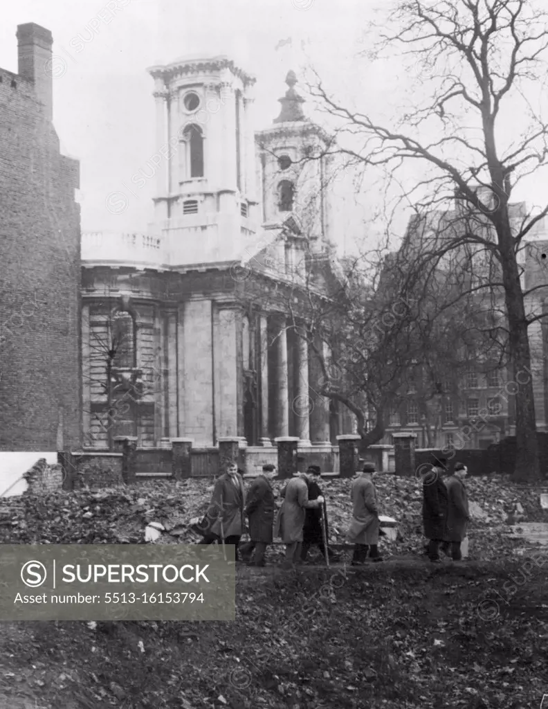 Eight C.I.D. men on the bomb site looking for the scone stone. On a bombed site in the shadows of Westminster the plaque which used to be attached to the Scone Stone was found by a passer by . Detectives then started a search of the site in Smith Square for the missing stone. January 07, 1951. (Photo by Daily Mail Contract Picture).