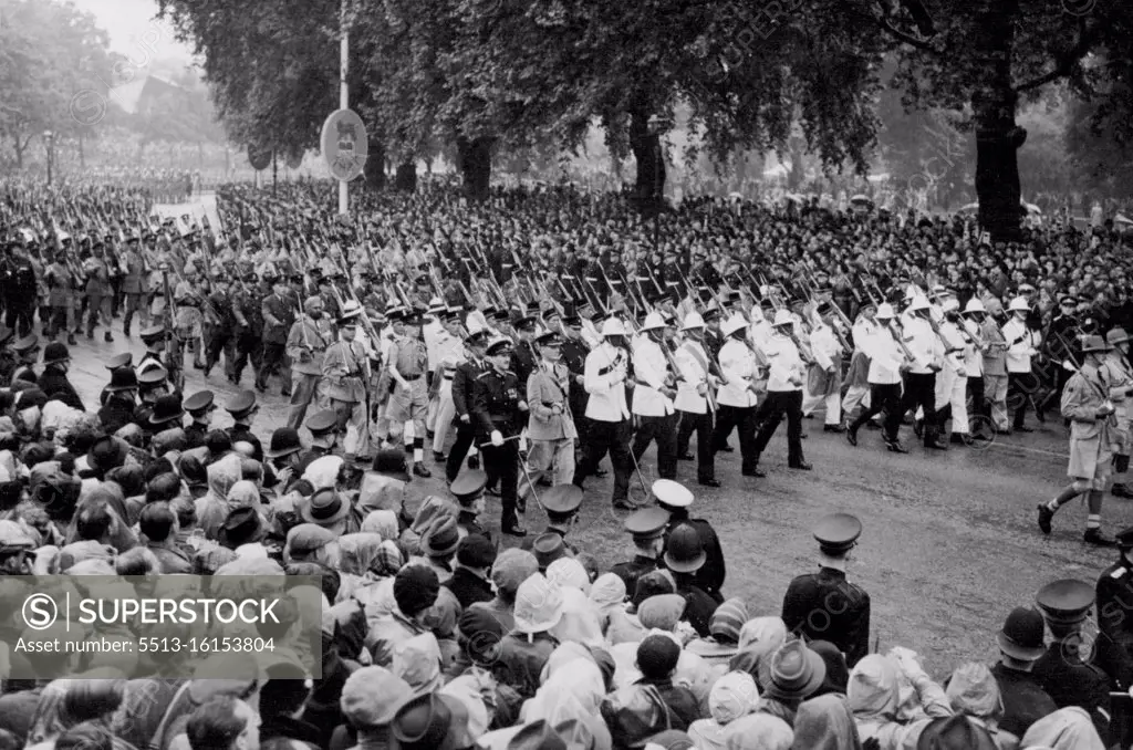 Commonwealth Contingents In The Great Coronation Procession -- Representative detachments from many countries marching in the Procession through Hyde Park, London. June 02, 1953. (Photo by Sport & General Press Agency, Limited).