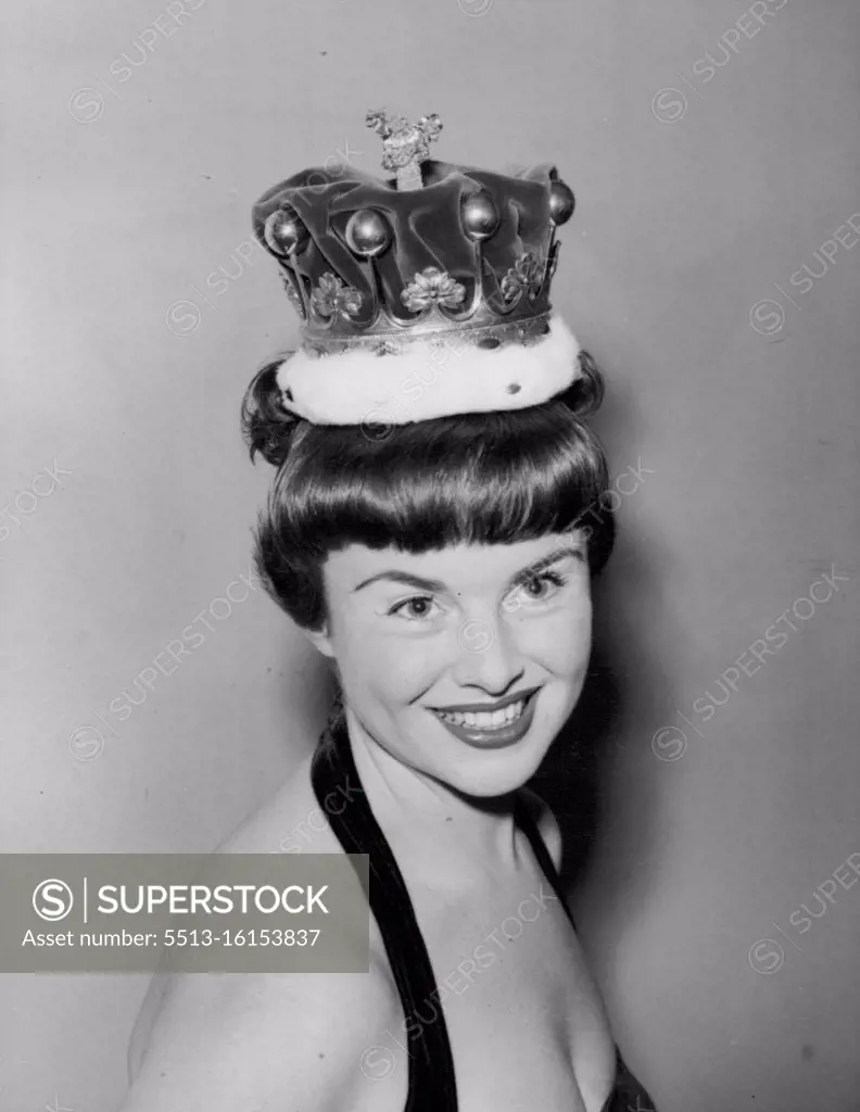 Coronation Hair-Style For A Countess -- Pretty Anne south wears an authentic peeress coronet above her fringe as she demonstrates a coronation hair-style at the Mayfair, London, salon of riche today, October 29. Riche also exhibited what were described as New Elizabethan Colffures. October 29, 1952. (Photo by Associated Press Photo).