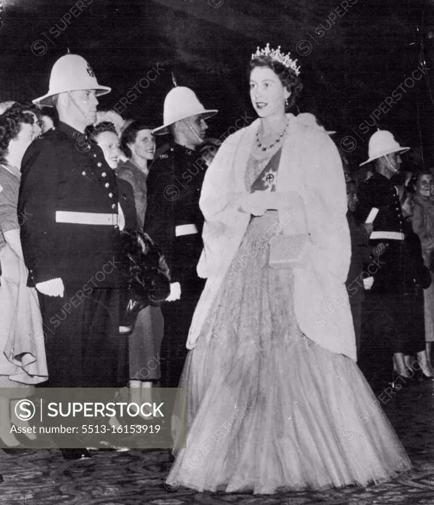 Princess Arrives For State Dinner -- Princess Elizabeth walks past Quebec Police on her way to the State dinner at the Chateau Frontenac here tonight. November 15, 1951. (Photo by AP Wirephoto). 