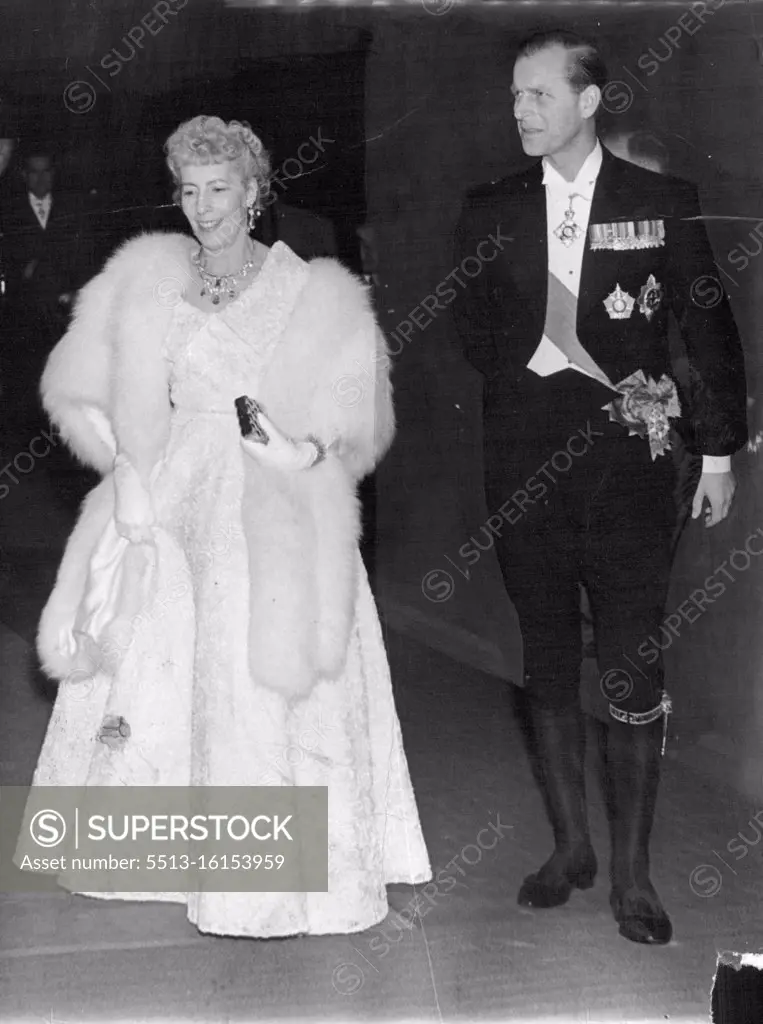 Gala Opera For ***** President -- Madame Craveiro Lopes and the Duke of Edinburgh arriving at the Opera House tonight. A Gala performance of "The bartered bride" was given in honour of the President of Portugal and Madame Craveiro Lopes at Covent garden opera house tonight. H.M. The queen the Duke of Edinburgh H.M. The queen mother and Princess Margaret together with members of the Government attended. October 27, 1955. (Photo by Paul Popper Ltd.).